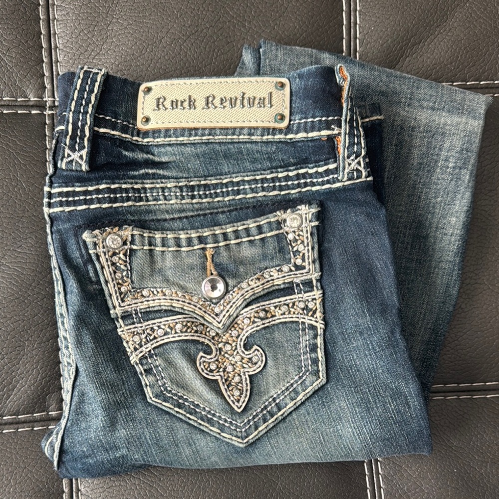 Rock Revival Blue Boot Cut Jeans with Ornate Design